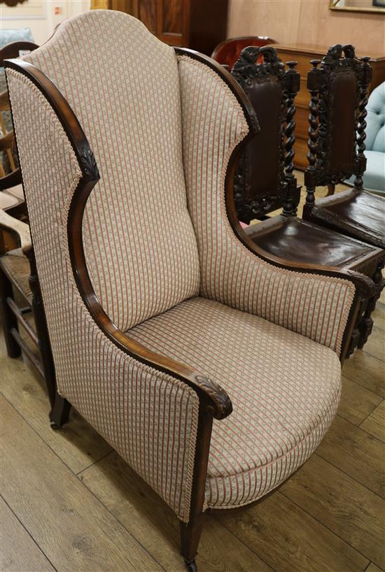 An Edwardian inlaid wing chair